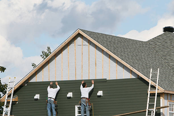 Professional Siding technician working in Newton, NC